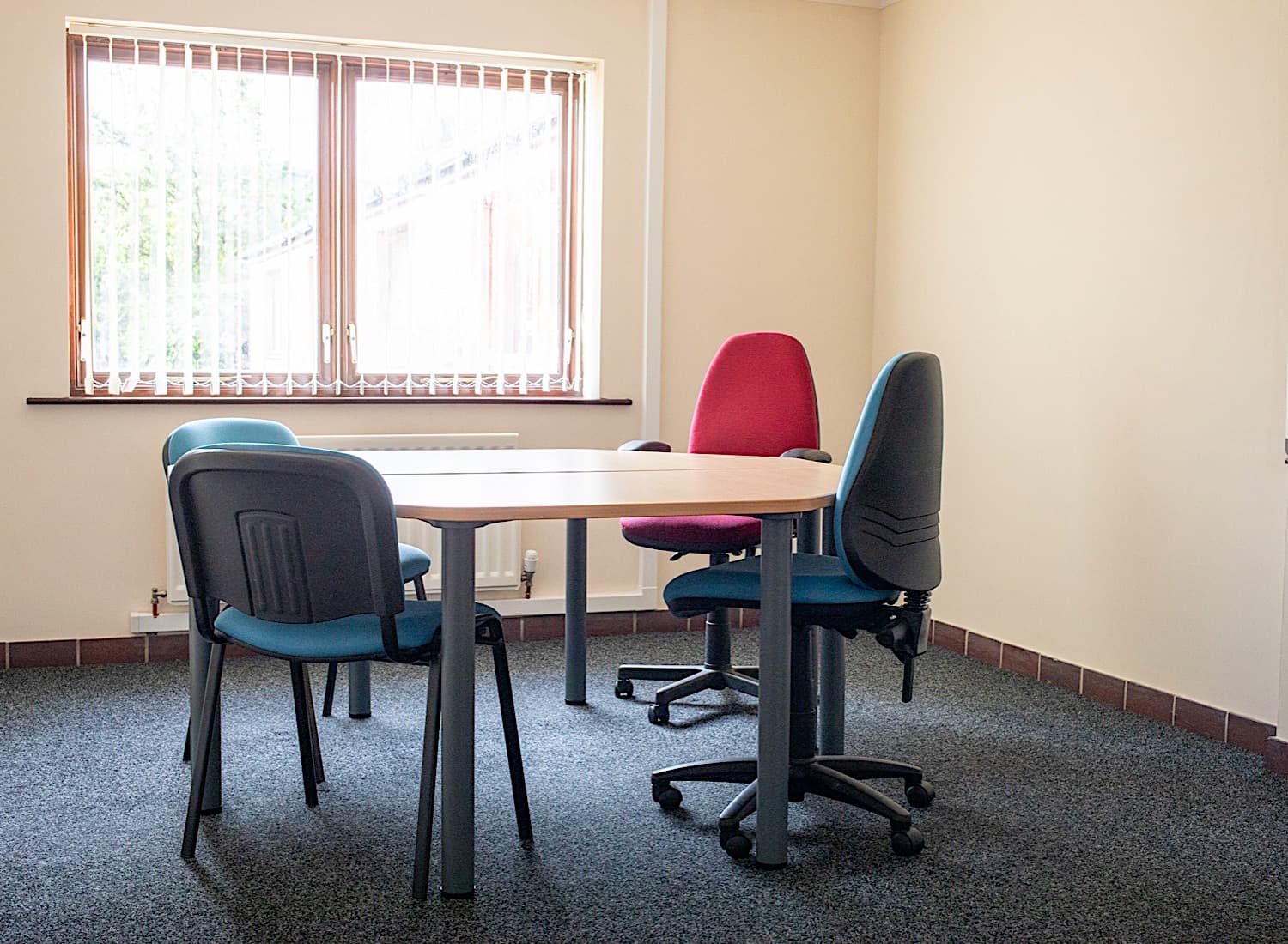 Private office suite with desk setup